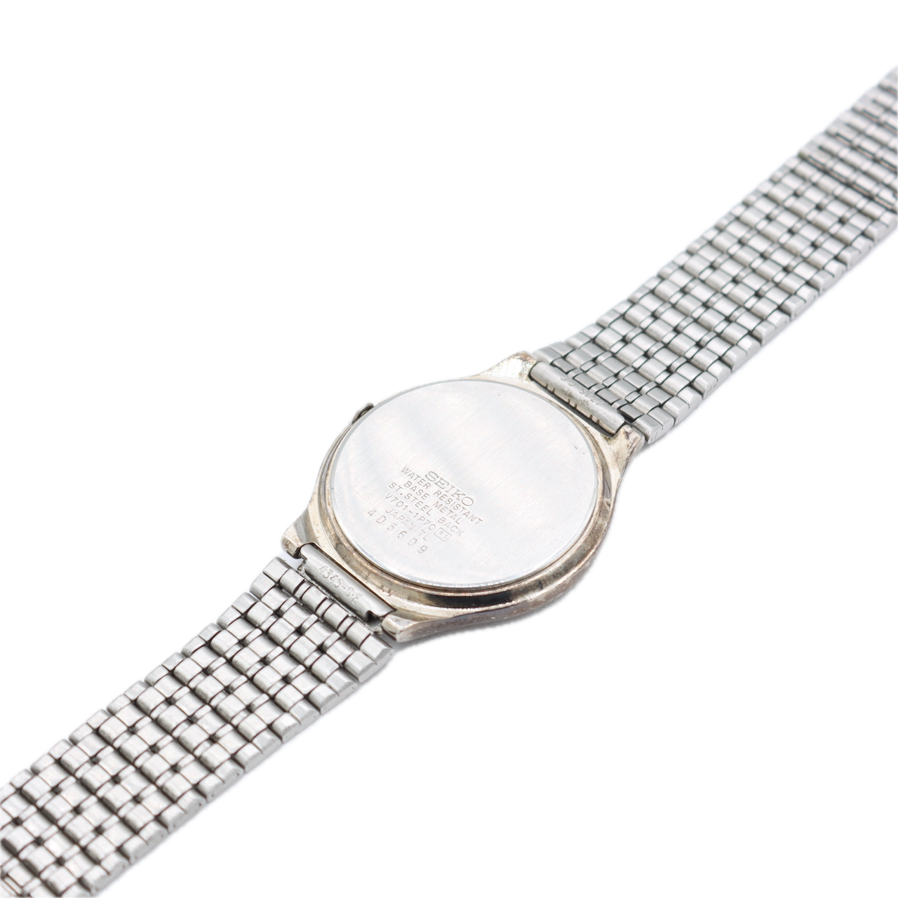 Vintage Seiko V701-1P70 Honeycomb Dial Men's Quartz Wristwatch Japan Steel